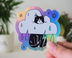 Rain Cloud Cat - Light mode | Holographic Vinyl Stickers of a grumpy Tuxedo Cat in a rain cloud costume