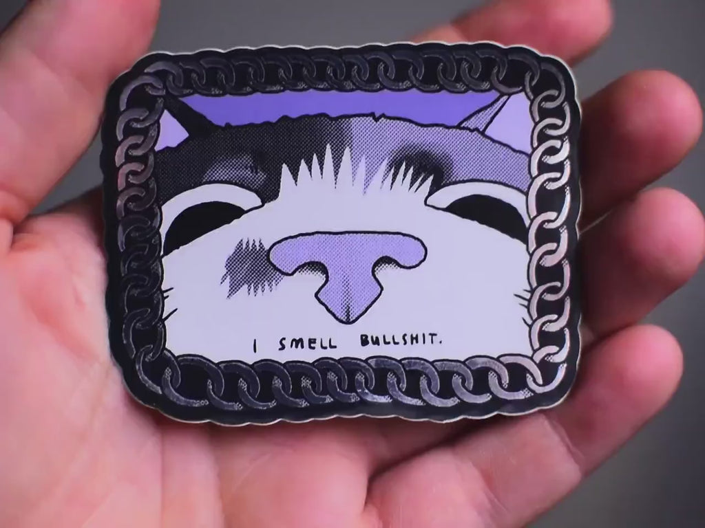 I smell bullshit | Funny chrome vinyl sticker of a cat that sniffs the viewer and calls out their bullshit framed with a silver chain